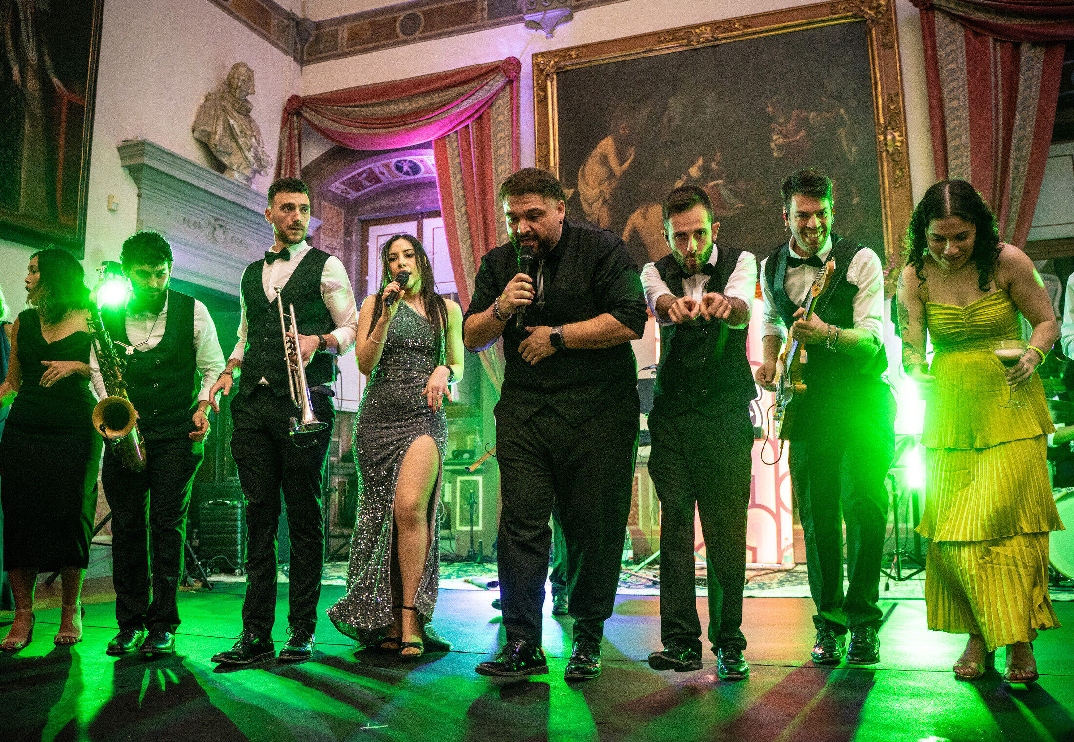 The Gloves musicians and wedding guests side by side during a live party.